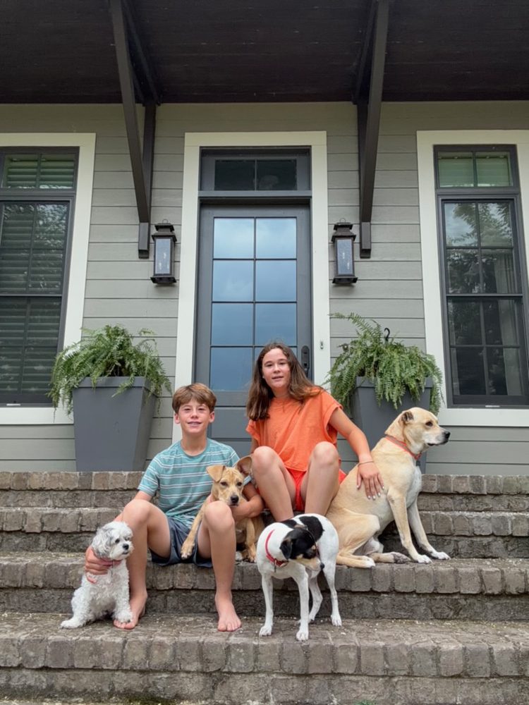Emma & Milo McKee. With their dogs Rosie, Pepper, Chip, and Tuk
